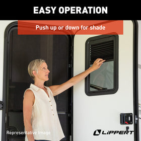 Lippert Components Thin Shade pulled down showing interior privacy benefit