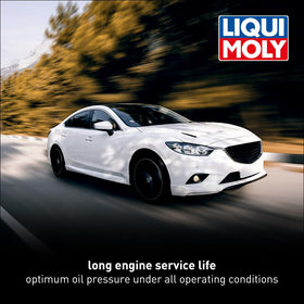 Liqui Moly being poured into an engine showing clean transfer and controlled flow