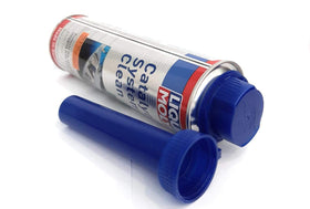 Liqui Moly bottle next to fuel cap showing size and coverage for up to 70 liters