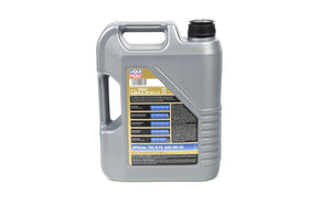 LIQUI MOLY pouring oil into engine bay demonstrating easy pour and correct volume