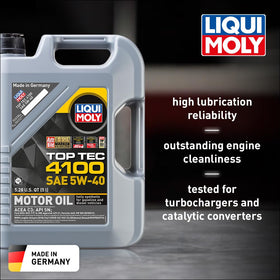 Liqui Moly oil being poured from the 5 L bottle to demonstrate spill‑free pour and convenience