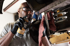 Liquid Wrench in a garage setting demonstrating easy maintenance and faster repairs