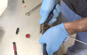 Lisle flaring tool in use on vehicle tubing for precise single or double flare