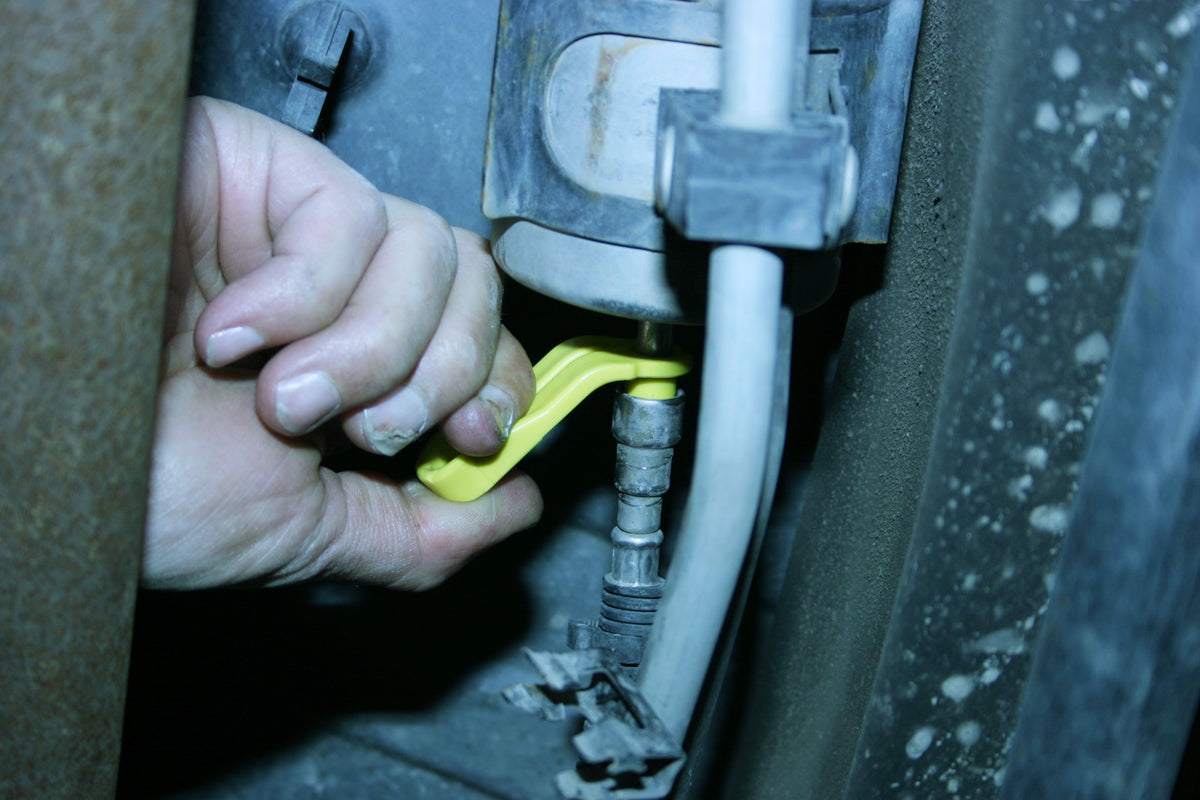Lisle close-up of angled handle and size markings for precise non-marring fit