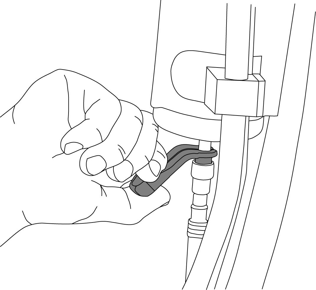 Lisle tools in use inside an engine bay accessing tight fuel connector safely