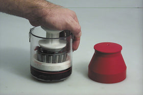 Lisle Handy Packer in use with bearing on piston benefit: flushes old grease cleanly