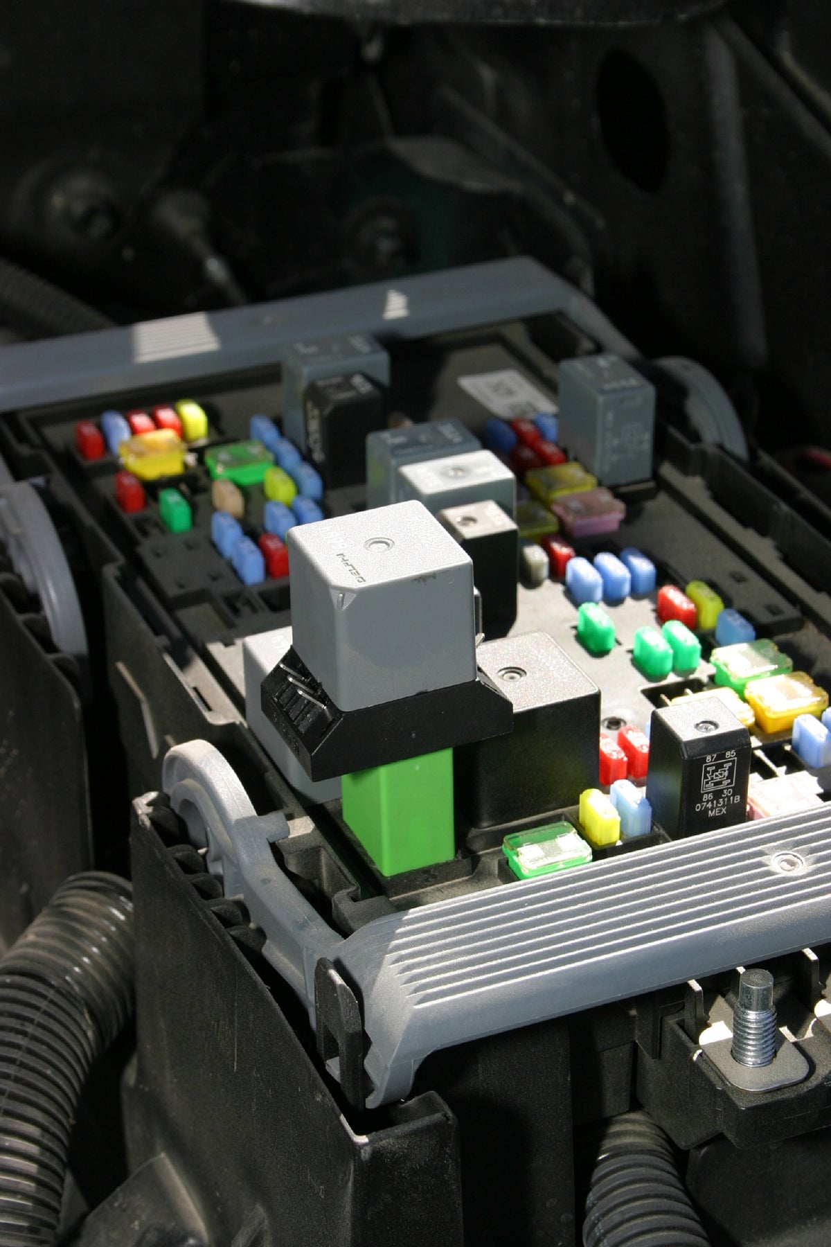 Lisle jumper in use with test leads attached demonstrating safe diagnostics