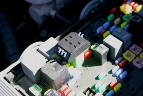 Lisle jumper beside a hand for size and scale to aid tool selection
