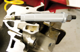 Lisle tool in use on Triton engine demonstrating clean plug tip extraction benefit