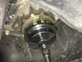Lisle wrench installed on a Toyota engine oil filter housing demonstrating safe removal