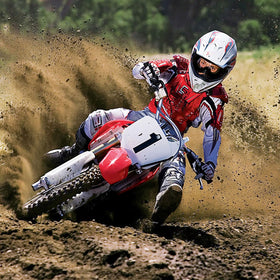 LMAVAG rider using goggles in off-road setting showing protection and visibility benefit