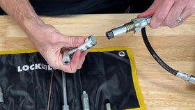 LockNLube kit in use on heavy equipment enabling quicker lubrication