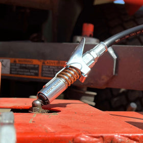 LockNLube in a workshop setting illustrating professional-grade maintenance use
