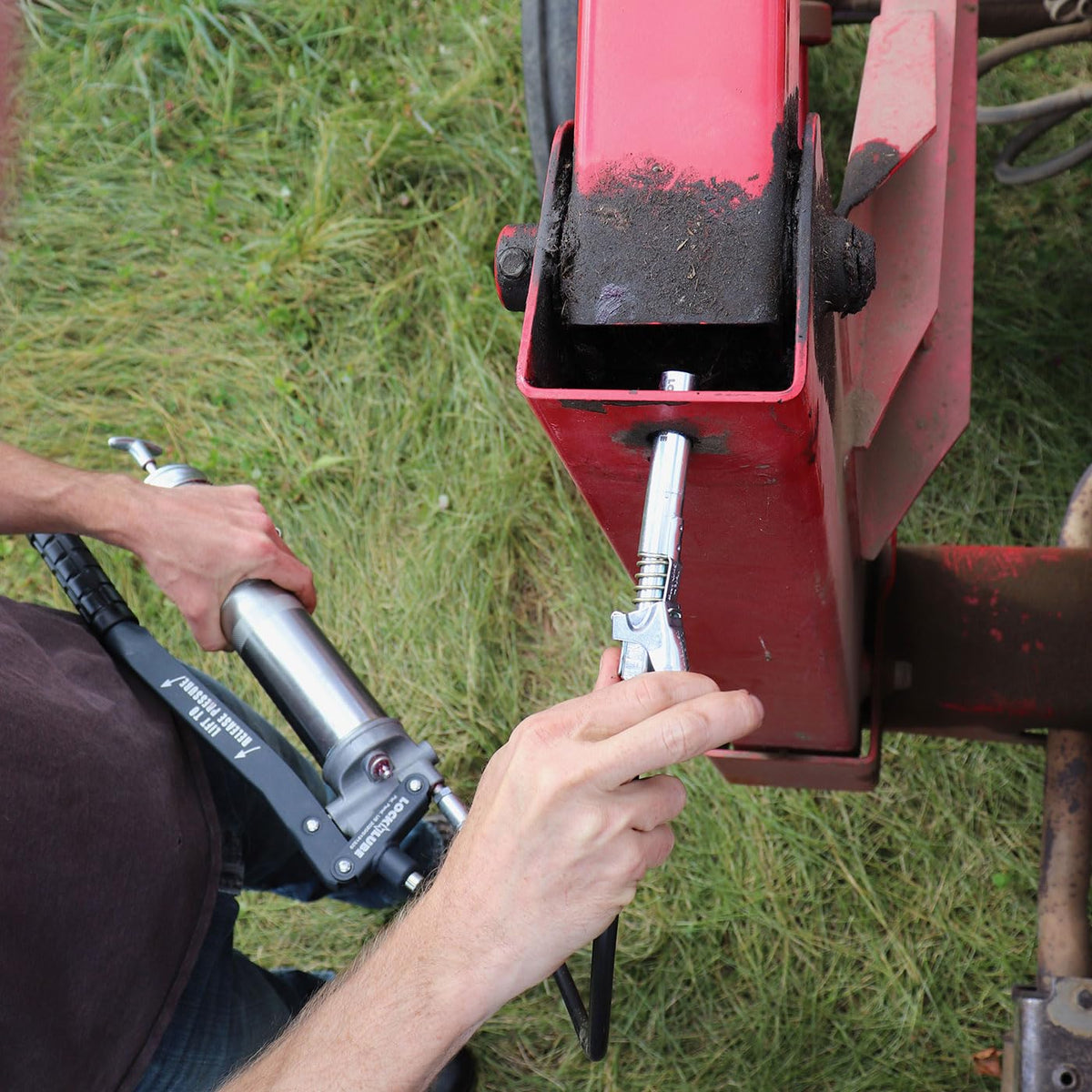 LockNLube attached to a Zerk fitting proving leak-free connection
