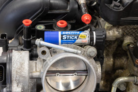Loctite 504466 in a workshop setting demonstrating reliable automotive fastener security