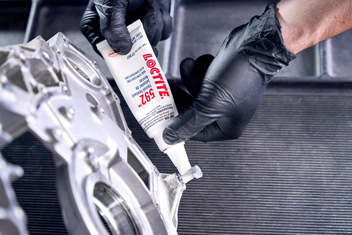 Loctite 592 next to ruler showing 50 ml scale and professional workshop use benefit