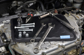 Lodesol pad laying inside a toolbox lid to organize tools and parts