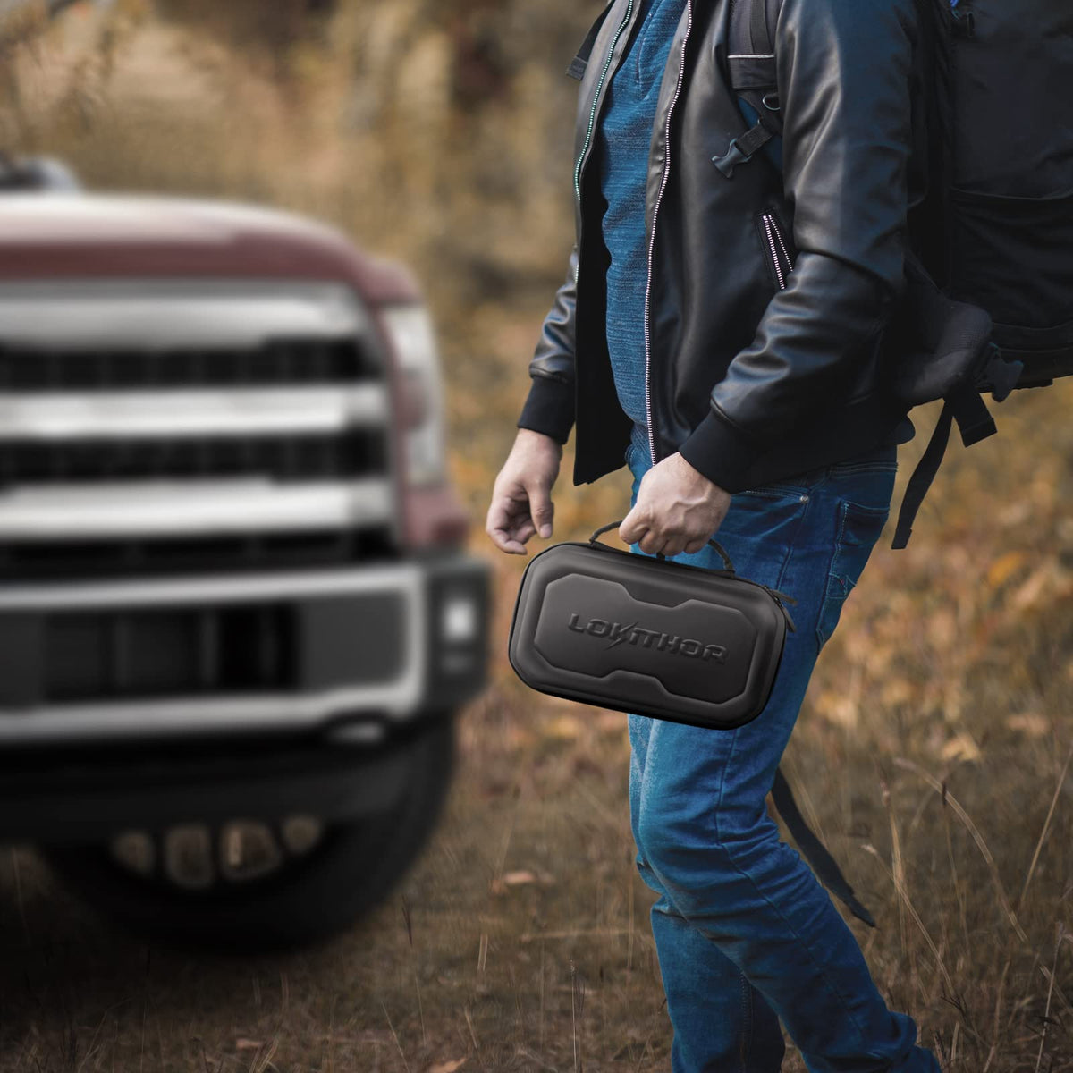 LOKITHOR CASE003 held in hands to show compact dimensions and portable scale