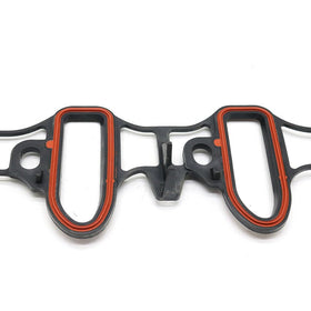 Lskioer gasket in garage setting on workbench implying professional-quality repair outcome