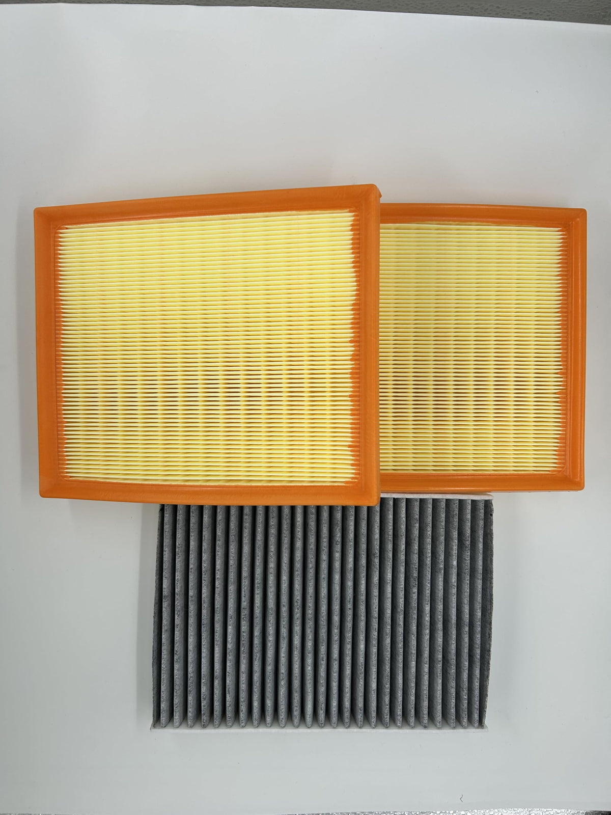 LTZLL kit contents laid out showing two engine filters and one cabin filter benefit