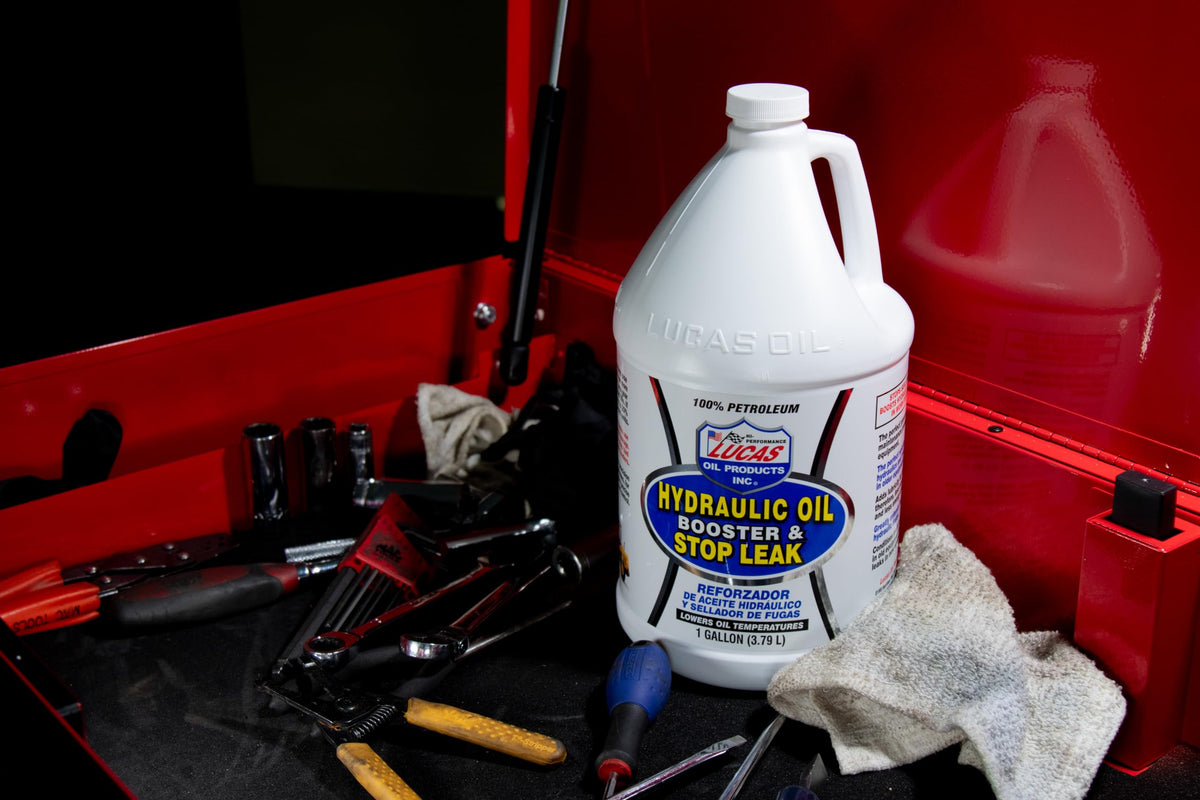 Lucas Oil booster in use on heavy equipment showing restored performance benefit