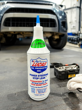 Lucas Oil 12 oz and 1 quart bottles side-by-side showing available sizes for service