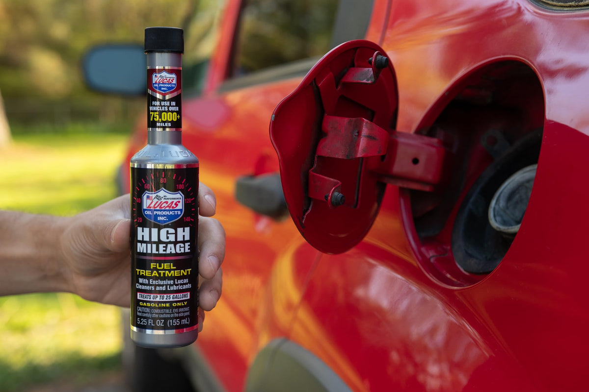 Lucas Oil label close-up highlighting high mileage formula and usage guidance
