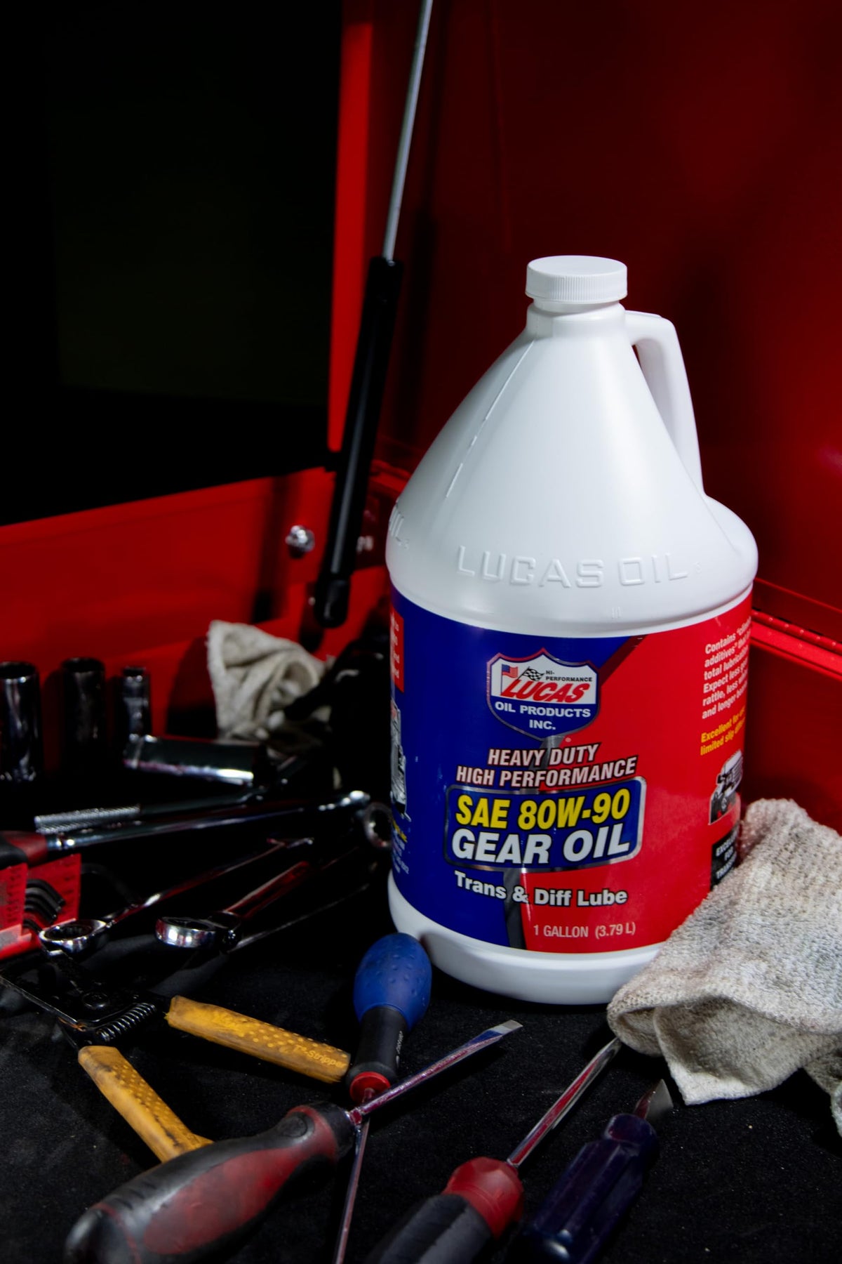 Lucas Oil being poured into a differential demonstrating clean application and protection