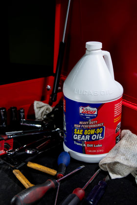 Lucas Oil being poured into a differential demonstrating clean application and protection