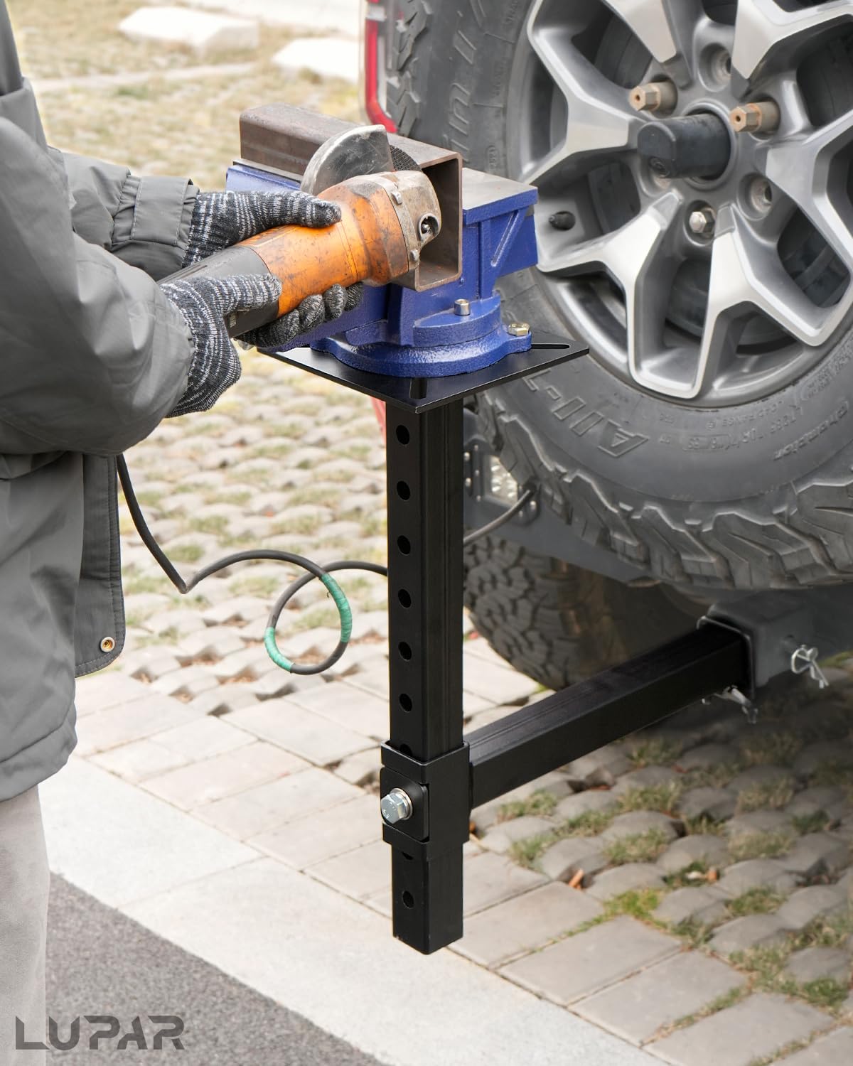 Lupar size comparison with hands showing compact transportable scale advantage