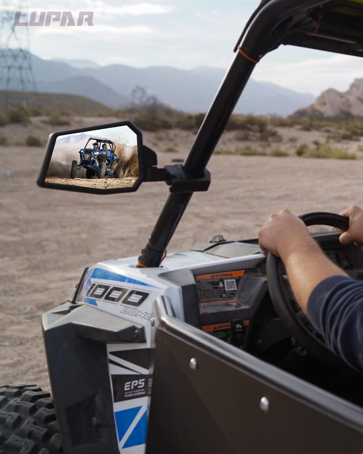 Lupar mirror on UTV in rugged terrain illustrating enhanced rear visibility for safer riding