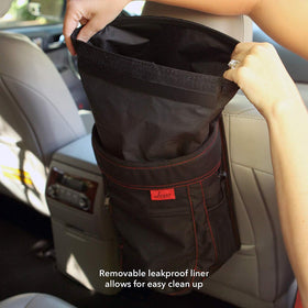 Lusso Gear open flip-top lid demonstrating spill protection and easy deposit