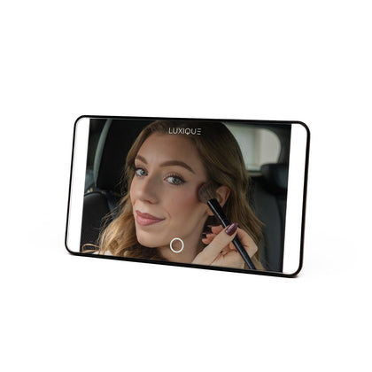 LUXIQUE front view showing compact visor mirror and clean reflection benefit