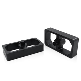 LVOUP front view of two lowering blocks showing durable finish and fitment benefit
