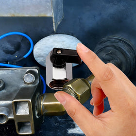 Lyreh cap next to a coin showing compact size for easy storage and handling