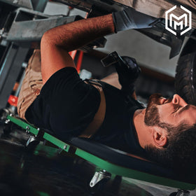 M-AUTO unfolded creeper flat showing full 36-inch bed for undercar access