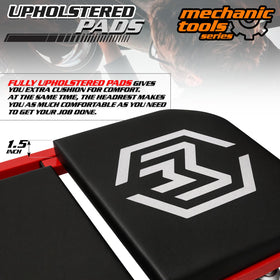 M-AUTO mechanic seated on creeper working on brake components with ease