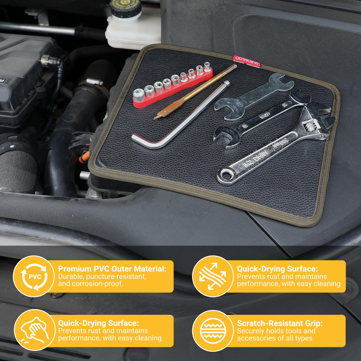 M-ROMLOO garage lifestyle image with mechanic using mat on a workbench to speed repairs