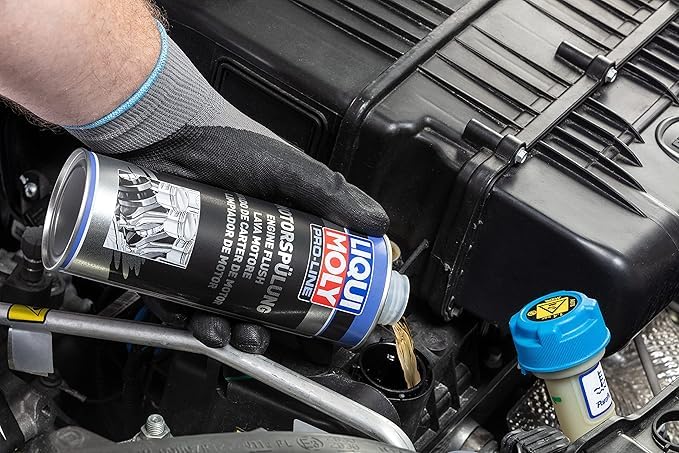 MAATSEN Liquii Moly pouring detail demonstrating easy addition to engine oil