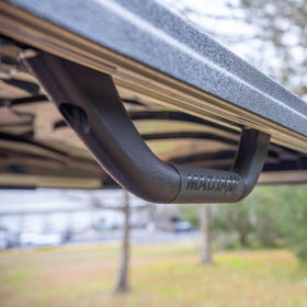 MADJAX grab handle beside ruler showing scale for correct sizing and fit