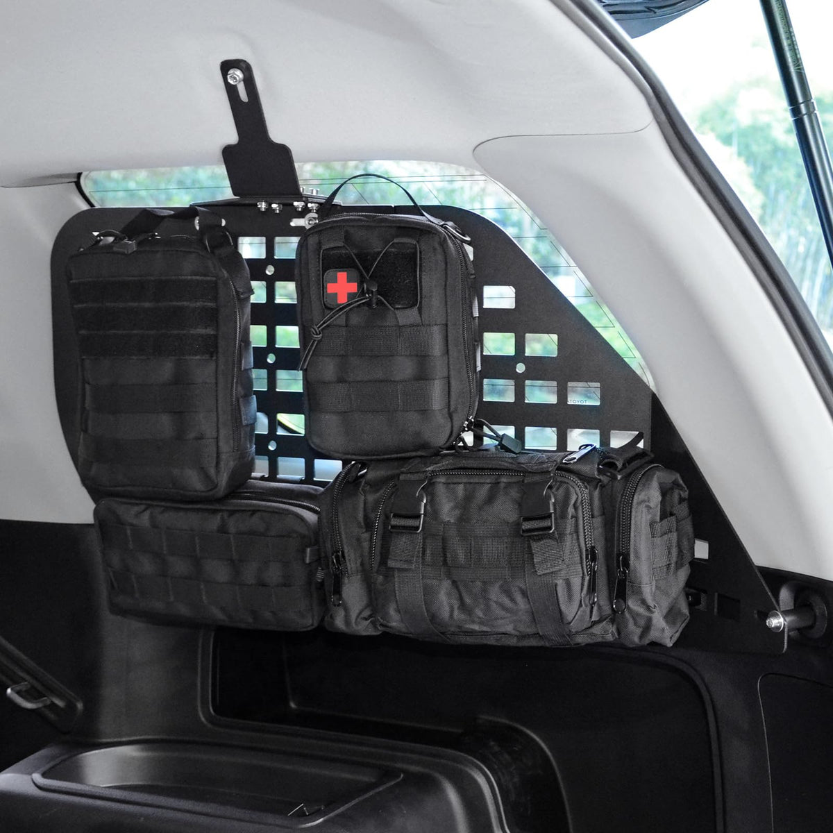 MAIKER shovel and winch rope mounted to panel for secure transport