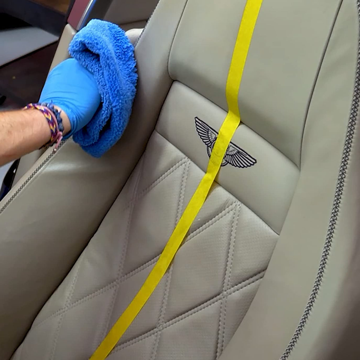 Malco in a clean car interior setting showing enhanced, protected leather surfaces