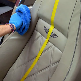 Malco in a clean car interior setting showing enhanced, protected leather surfaces