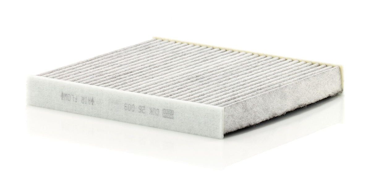 MANN-FILTER activated carbon layer closeup revealing adsorption media benefit