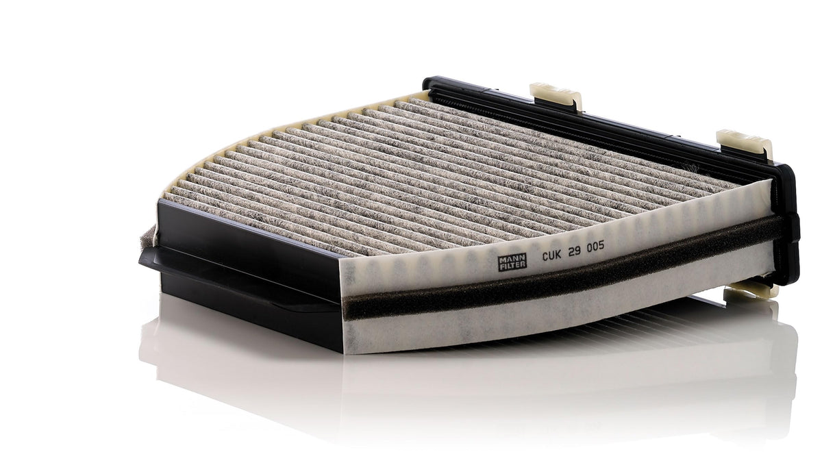 MANN-FILTER close-up of activated carbon layer capturing odors and gases