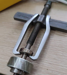 MANNIFEN tool staged in garage setting illustrating professional utility and reliability