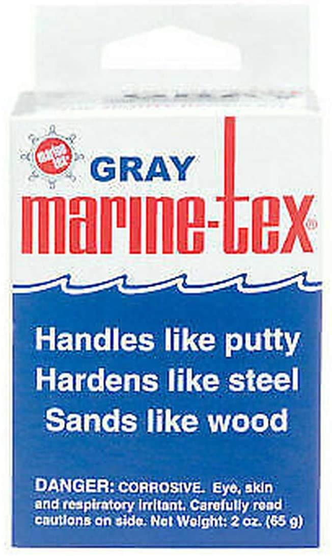 Marine Tex putty application closeup kneaded into repair for durable bond
