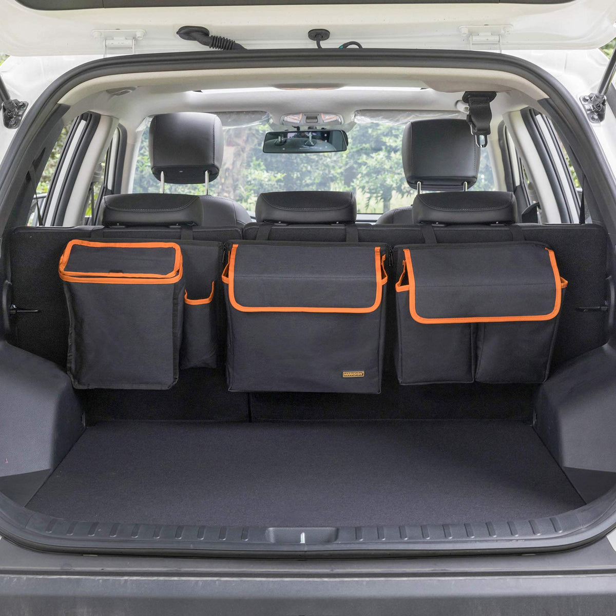 MARKSIGN front view organizer hung on backseat showing tidy storage and easy access