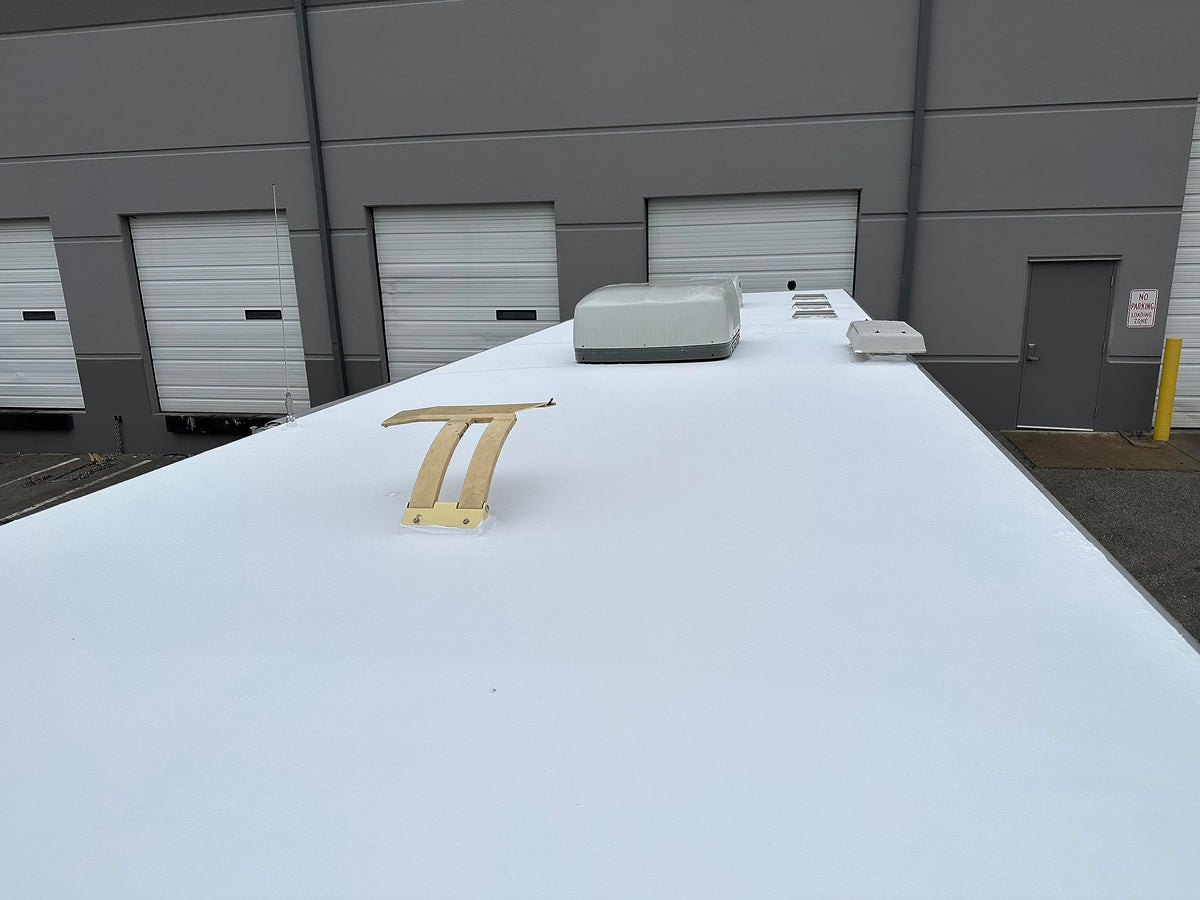 Marlin Coatings being rolled onto an RV roof demonstrating easy one-coat application