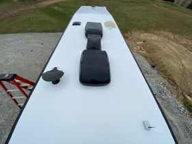 Marlin Coatings applied area beside uncoated deck to show coverage comparison benefit
